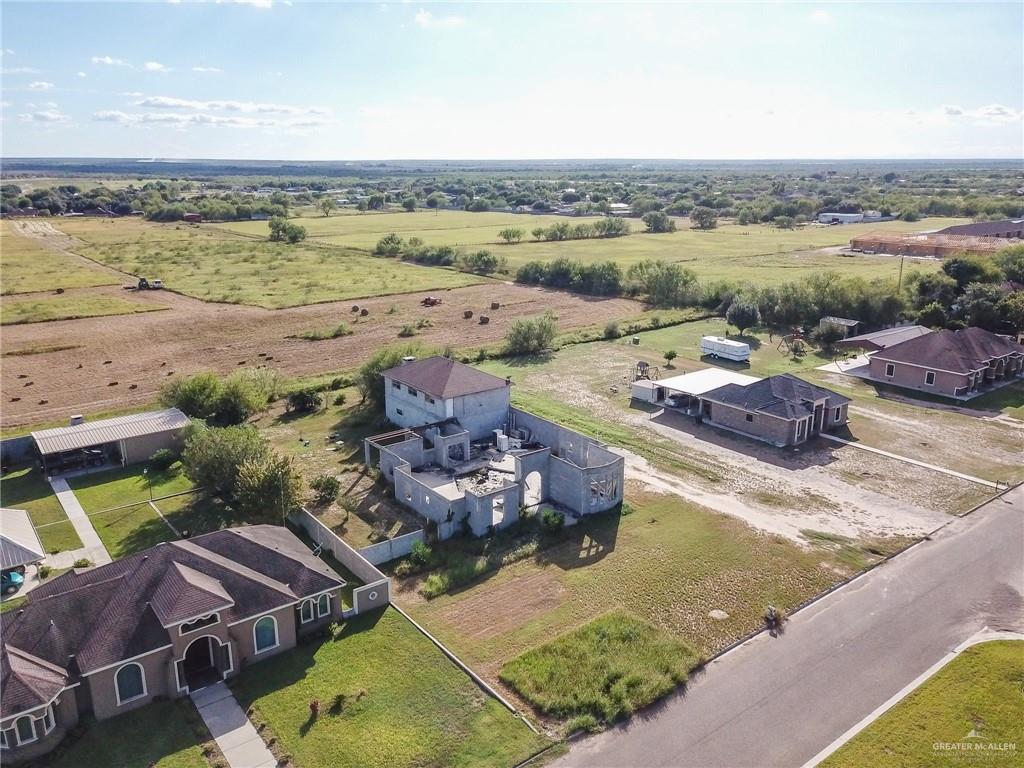 76 Marissa Street Rio Grande City, TX 78582 - Photo 8 of 10 a view of a lake with lawn chairs