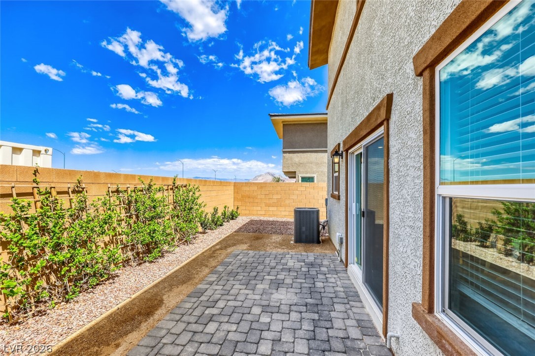 911 Cadence View Way Henderson, NV 89011 - Photo 20 of 28 This outdoor patio offers a perfect setting for relaxation or entertaining.