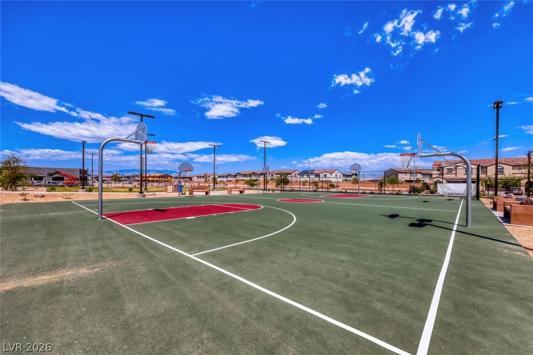 911 Cadence View Way Henderson, NV 89011 - Photo 24 of 28 This spacious outdoor court offers ample room for recreation under the open sky.