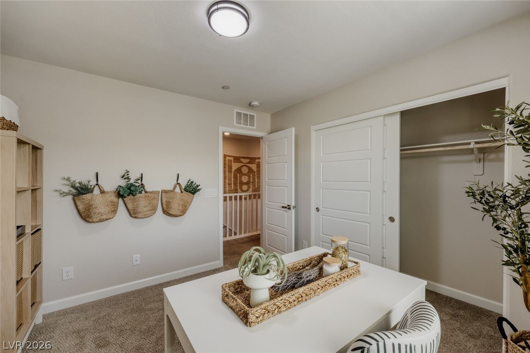911 Cadence View Way Henderson, NV 89011 - Photo 10 of 28 This versatile room offers an ideal setting for an office, studio, or guest accommodations.