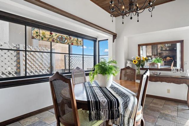 a kitchen with stainless steel appliances granite countertop a lot of counter space and wooden floors