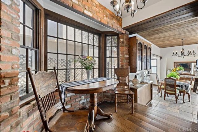 a bedroom with a large bed and a large window