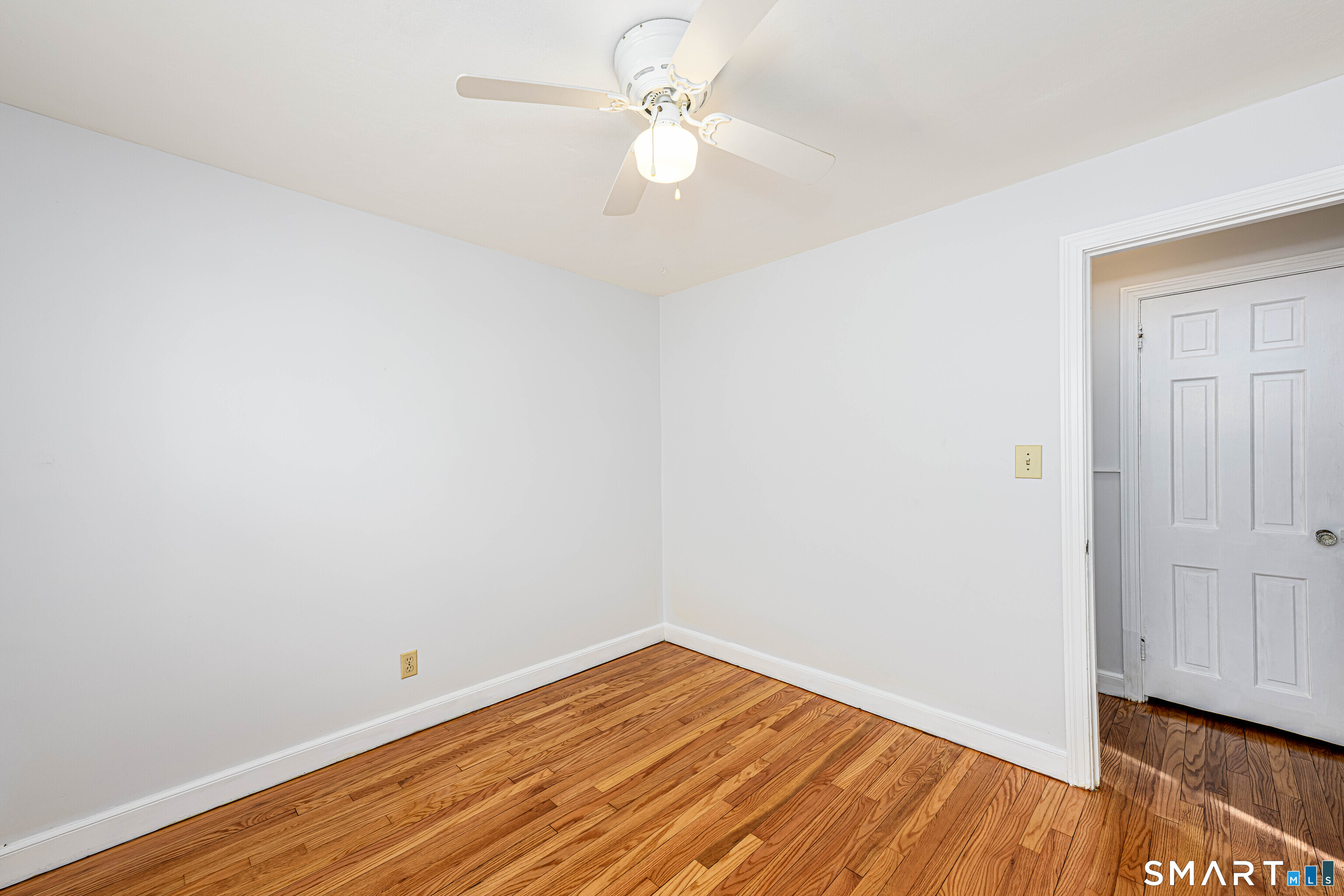 84 Piper Road Hamden, CT 06514 - Photo 19 of 28 wooden floor in an empty room