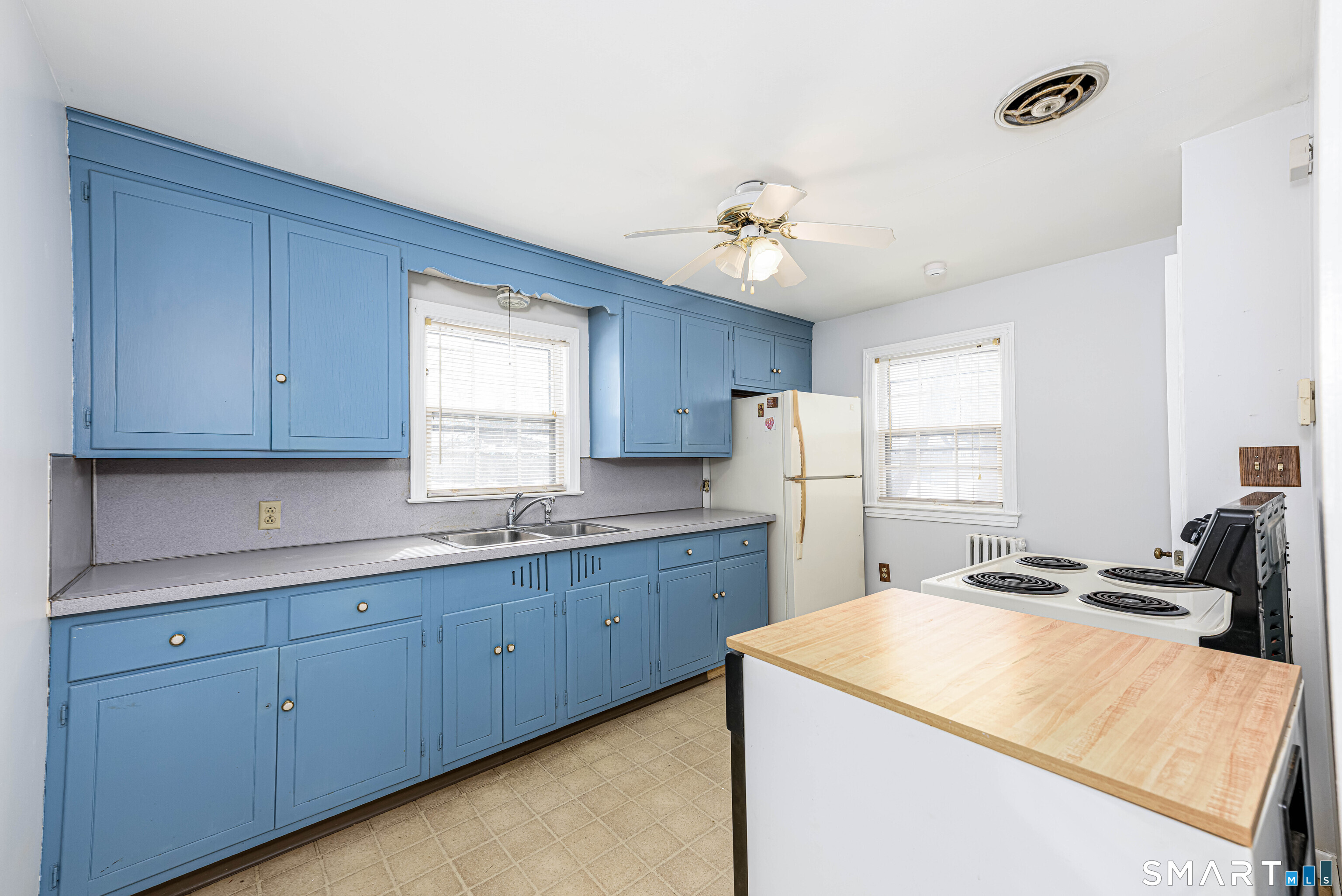 84 Piper Road Hamden, CT 06514 - Photo 10 of 28 a kitchen with cabinets a sink and appliances