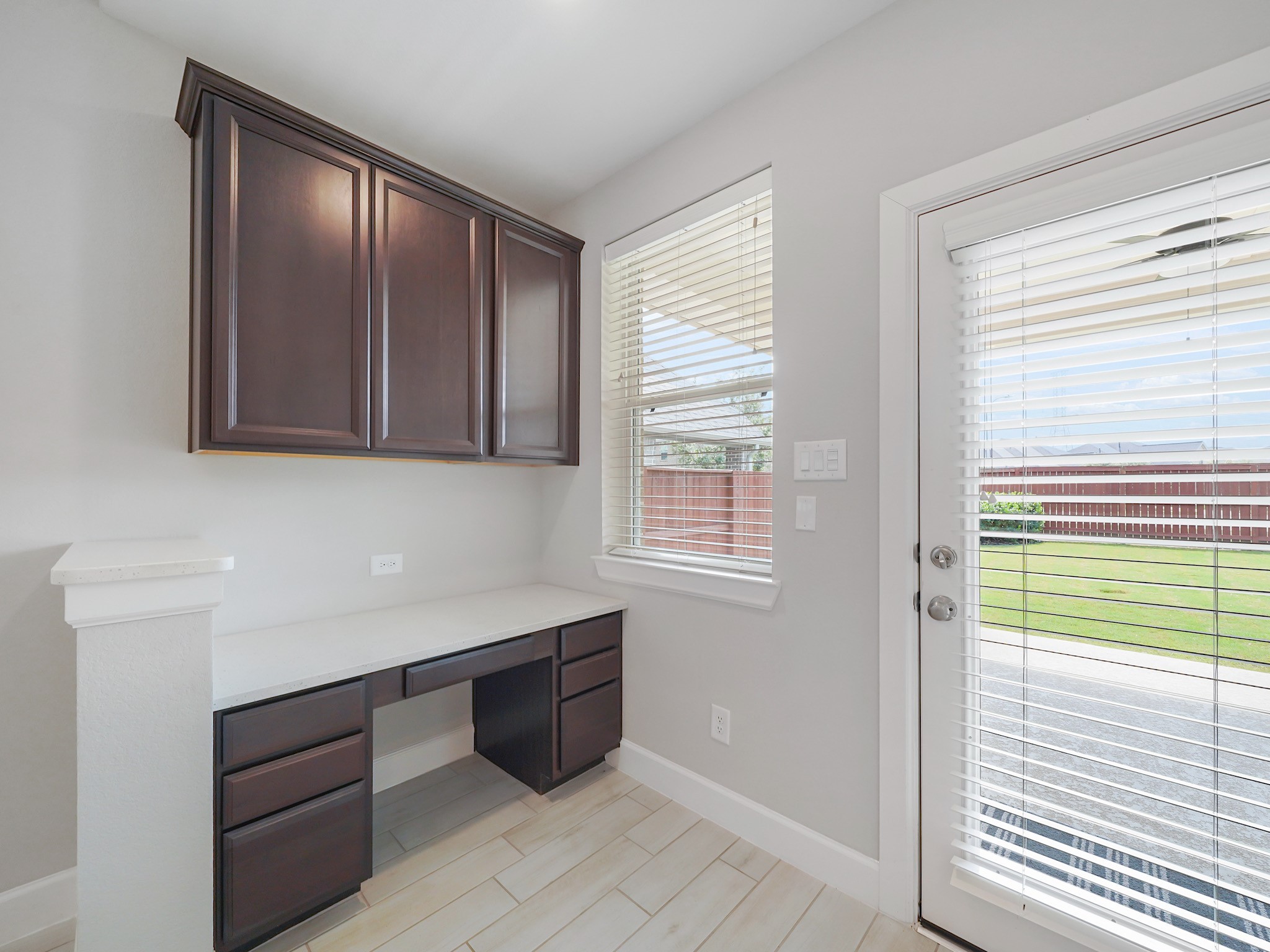 6919 Myrtle Drive Katy, TX 77493 - Photo 16 of 38 a room with a window and a dresser