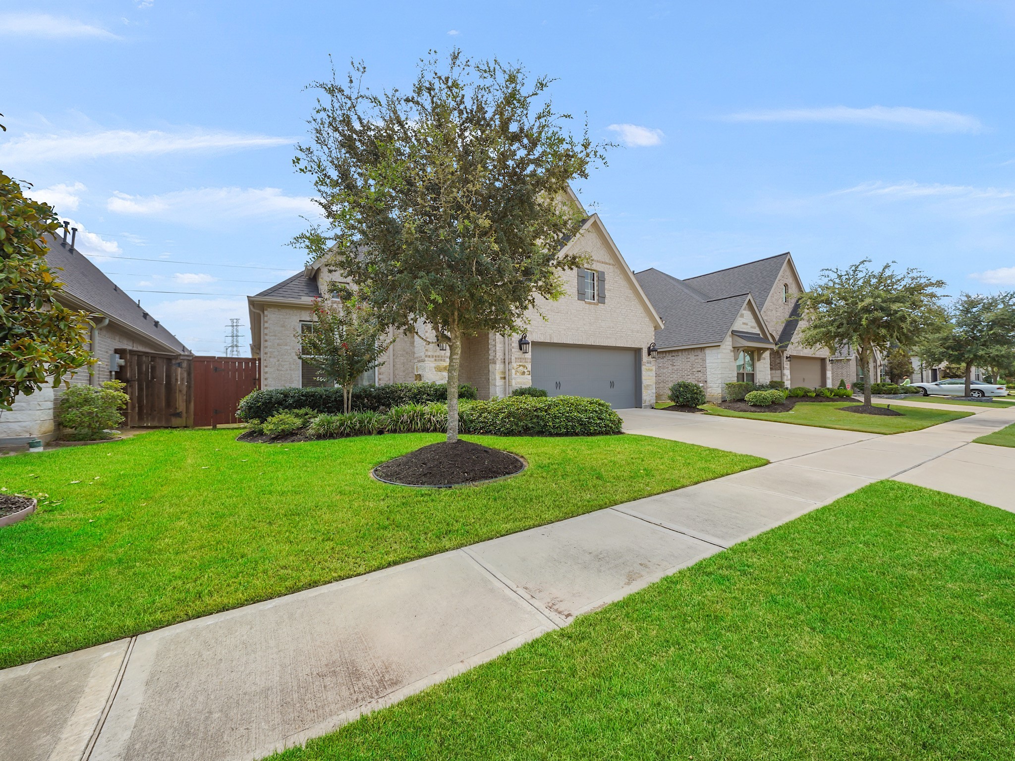 6919 Myrtle Drive Katy, TX 77493 - Photo 2 of 38 front view of a house with a yard