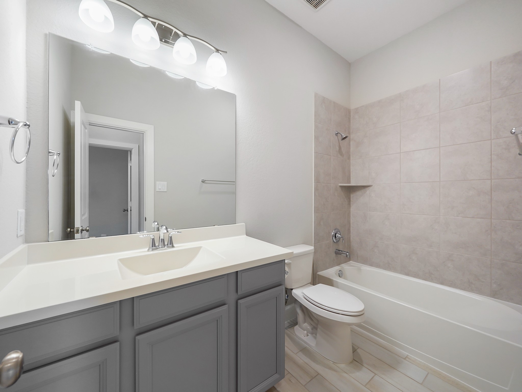 6919 Myrtle Drive Katy, TX 77493 - Photo 32 of 38 a bathroom with a sink a toilet and shower