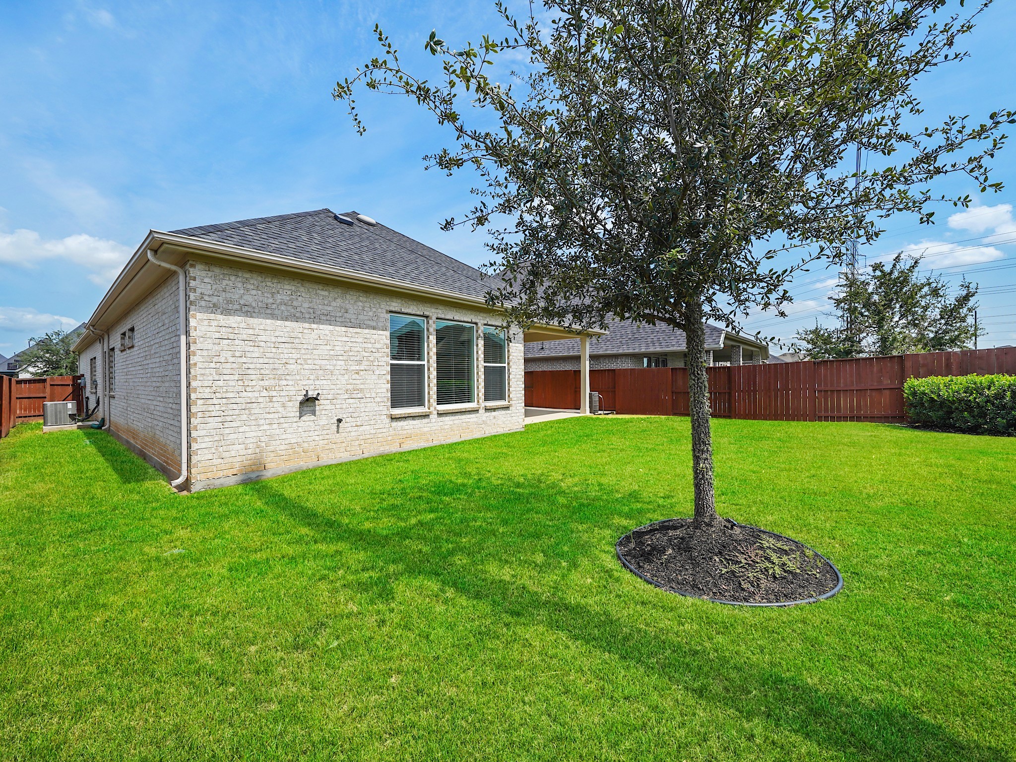 6919 Myrtle Drive Katy, TX 77493 - Photo 36 of 38 a view of a house with a backyard