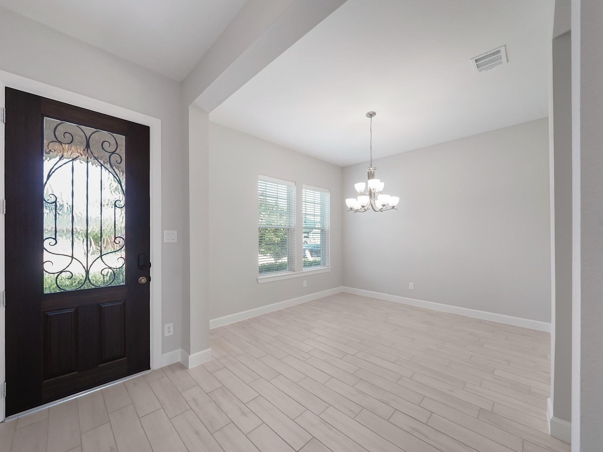 6919 Myrtle Drive Katy, TX 77493 - Photo 6 of 38 a view of empty room with window