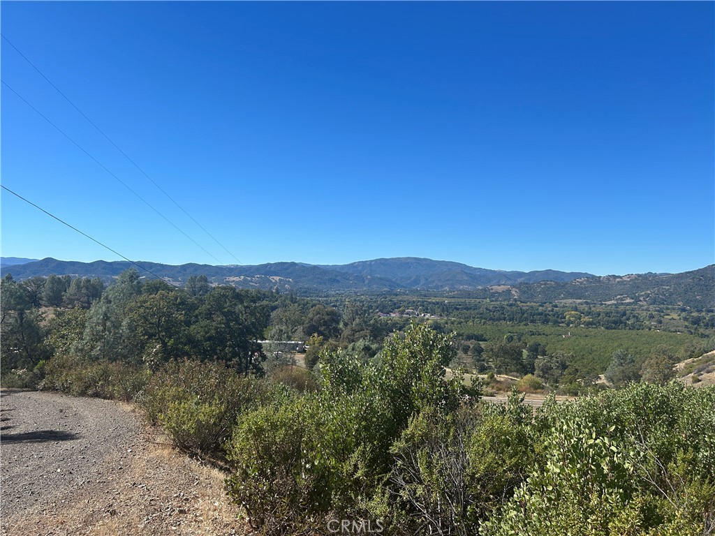 1725 Clover Valley Road Upper Lake, CA 95485 - Photo 14 of 14 a view of a town with mountains in the background