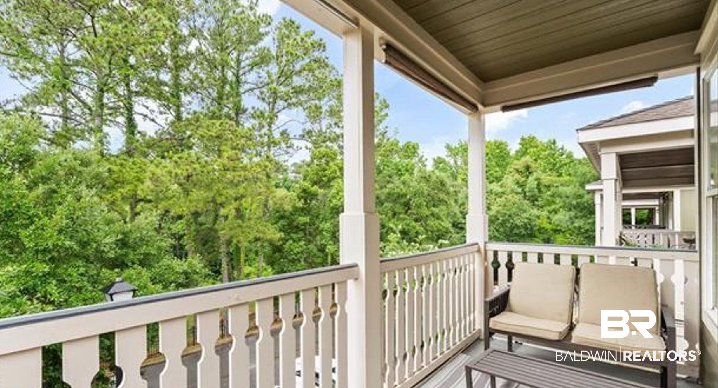 25806 Pollard Road, Unit 203 Daphne, AL 36526 - Photo 6 of 14 Balcony featuring view of wooded area