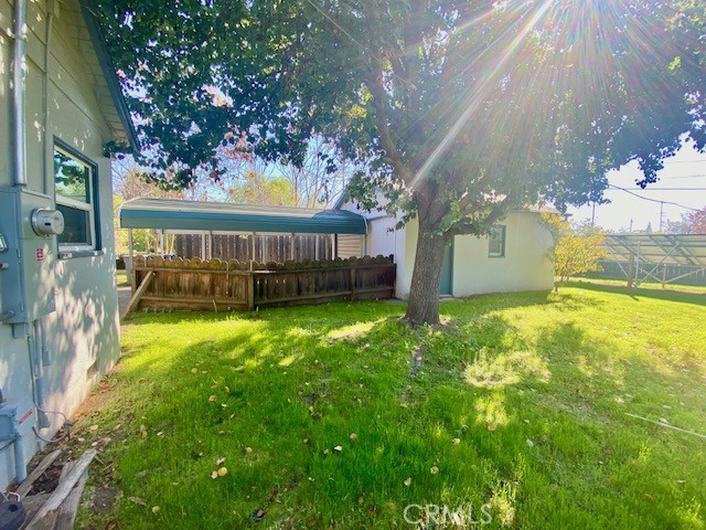 8 West 25th Street Merced, CA 95340 - Photo 12 of 14 a view of a house with swimming pool