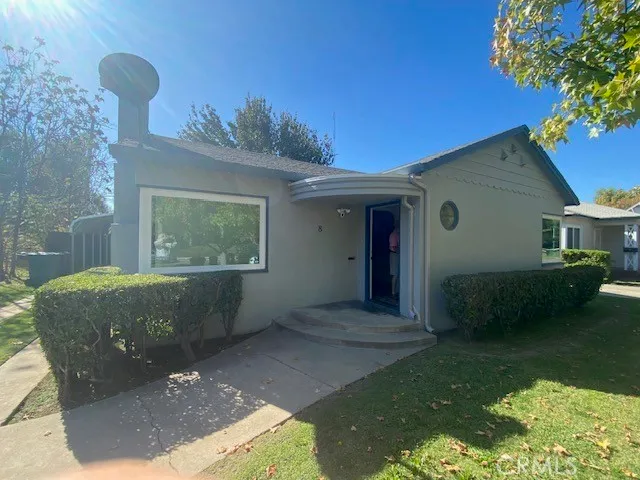 a view of a back yard of the house