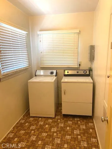 a utility room with a washer and dryer