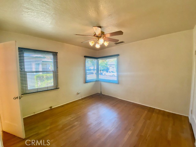 8 West 25th Street Merced, CA 95340 - Photo 9 of 14 a view of an empty room with a window