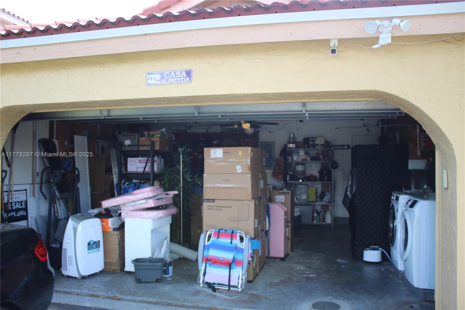 17320 Northwest 62nd Place Hialeah, FL 33015 - Photo 15 of 27 a utility room with lot of items