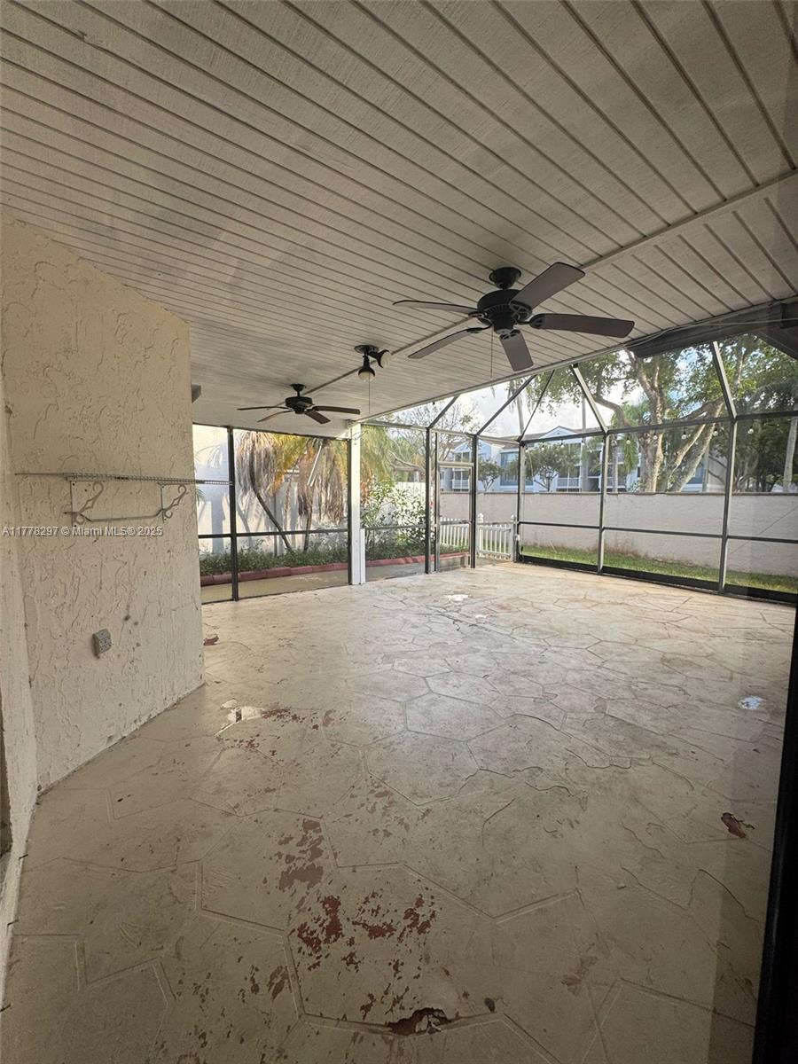 17320 Northwest 62nd Place Hialeah, FL 33015 - Photo 23 of 27 a view of empty room with wooden floor
