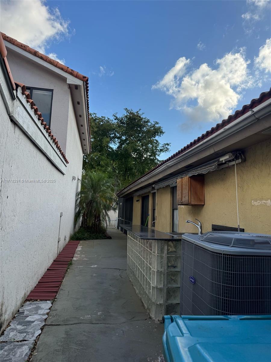 17320 Northwest 62nd Place Hialeah, FL 33015 - Photo 27 of 27 a backyard of a house with lots of green space