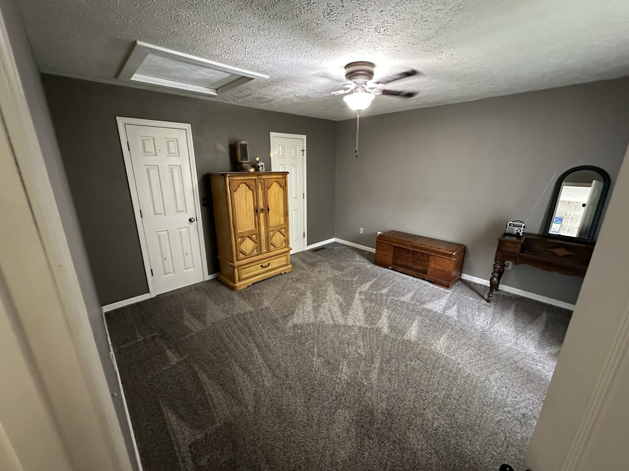 576 Carroll Hollow Road Waynesboro, TN 38485 - Photo 18 of 40 a view of a livingroom with a workspace