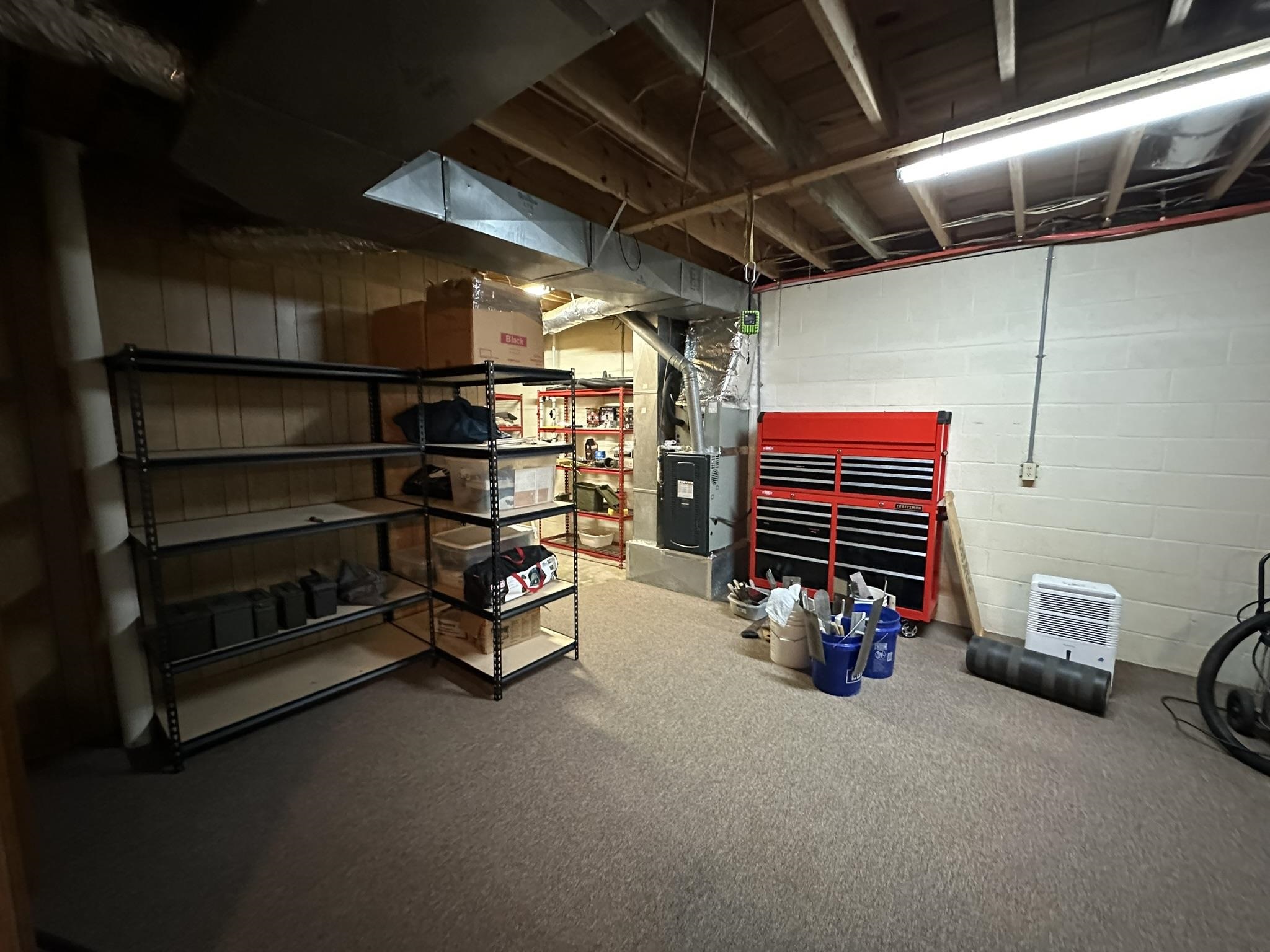 576 Carroll Hollow Road Waynesboro, TN 38485 - Photo 28 of 40 a view of a storage room with racks