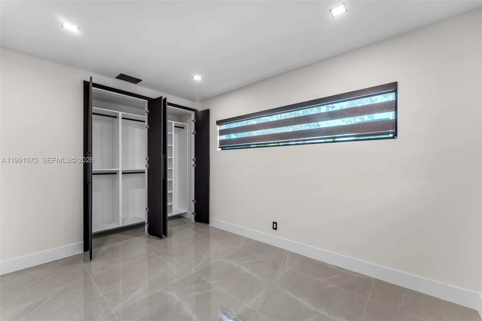 7920 Southwest 132nd Street Pinecrest, FL 33156 - Photo 20 of 45 a view of an empty room