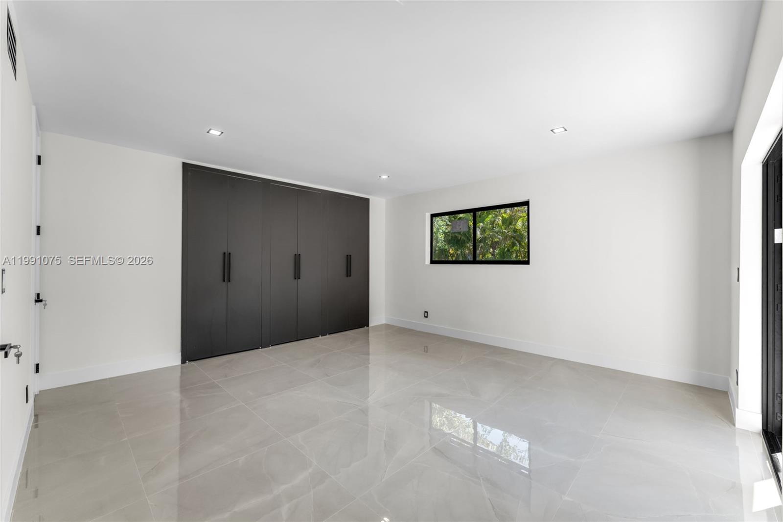 7920 Southwest 132nd Street Pinecrest, FL 33156 - Photo 22 of 45 a view of an empty room