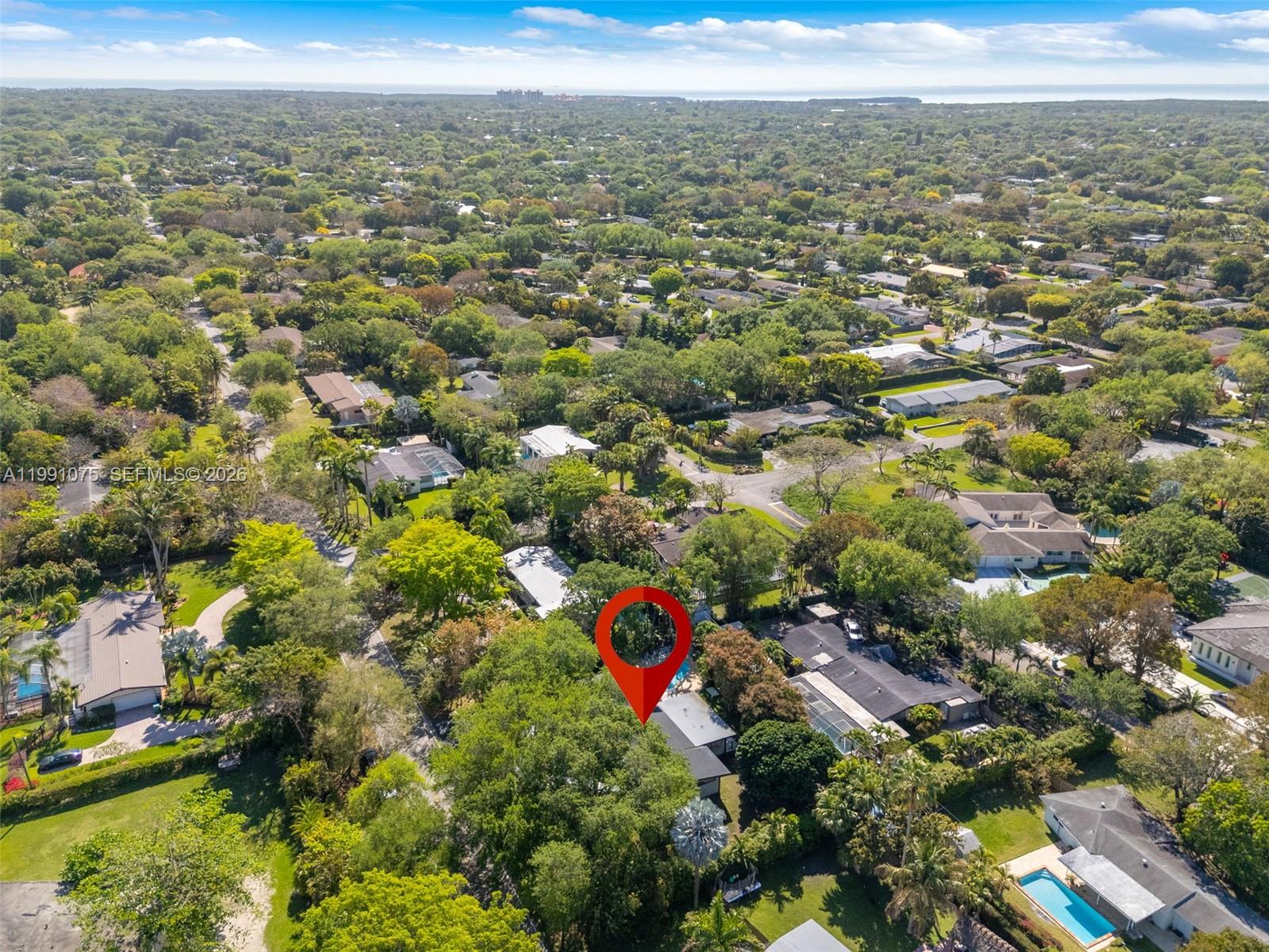 7920 Southwest 132nd Street Pinecrest, FL 33156 - Photo 41 of 45 an aerial view of multiple house
