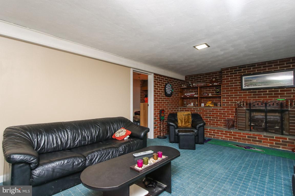 7406 Rockridge Road Baltimore, MD 21208 - Photo 25 of 38 Family roomwith Gas fireplace