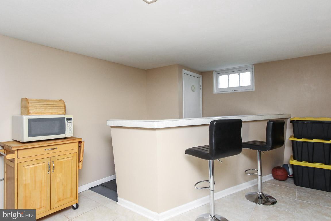 7406 Rockridge Road Baltimore, MD 21208 - Photo 28 of 38 Basement Bar