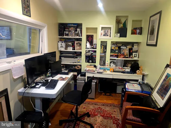 a view of a workspace with furniture