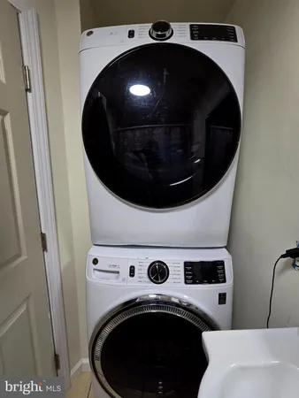 a utility room with dryer and washer