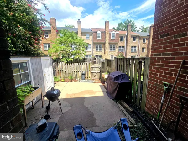 a view of a balcony with chairs