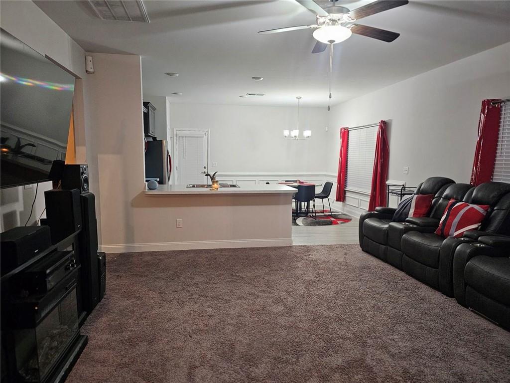 2153 Red Oak Circle Union City, GA 30291 - Photo 17 of 34 a living room with furniture and a flat screen tv