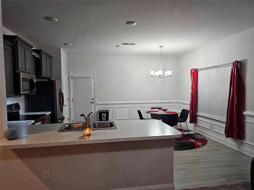 2153 Red Oak Circle Union City, GA 30291 - Photo 18 of 34 a bathroom with a sink and a mirror