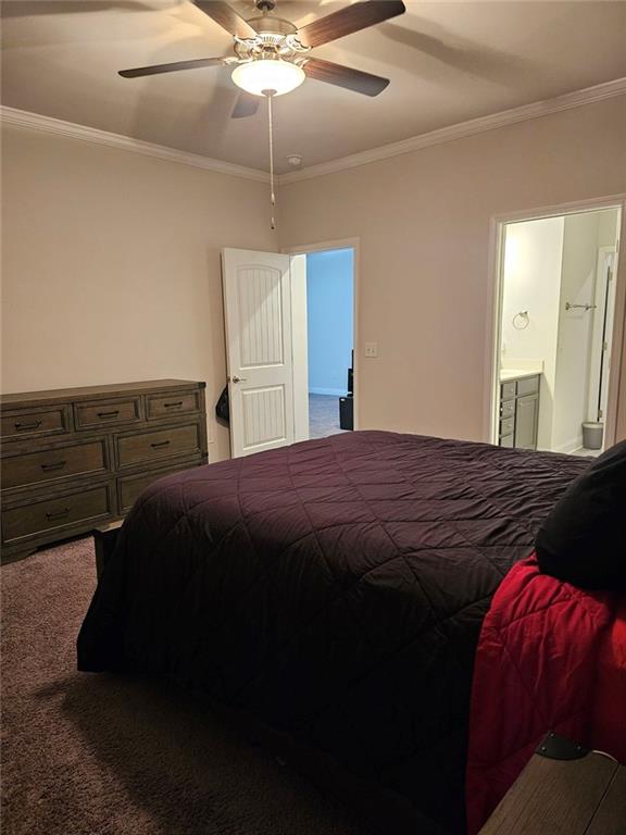 2153 Red Oak Circle Union City, GA 30291 - Photo 27 of 34 a bedroom with a bed and a chandelier