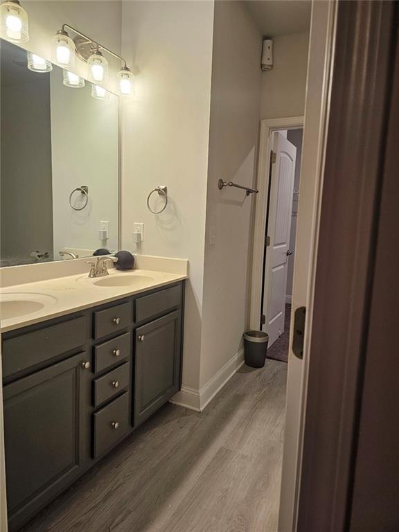 2153 Red Oak Circle Union City, GA 30291 - Photo 28 of 34 a bathroom with a double vanity sink and a mirror