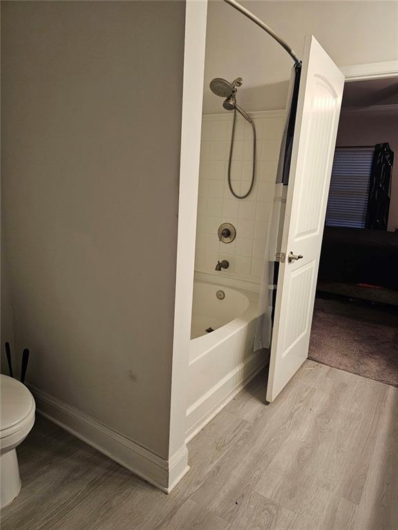 2153 Red Oak Circle Union City, GA 30291 - Photo 29 of 34 a bathroom with a tub and a shower