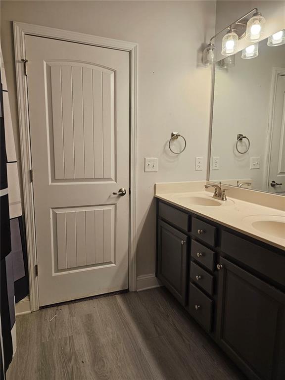 2153 Red Oak Circle Union City, GA 30291 - Photo 30 of 34 a bathroom with a double vanity sink and a mirror