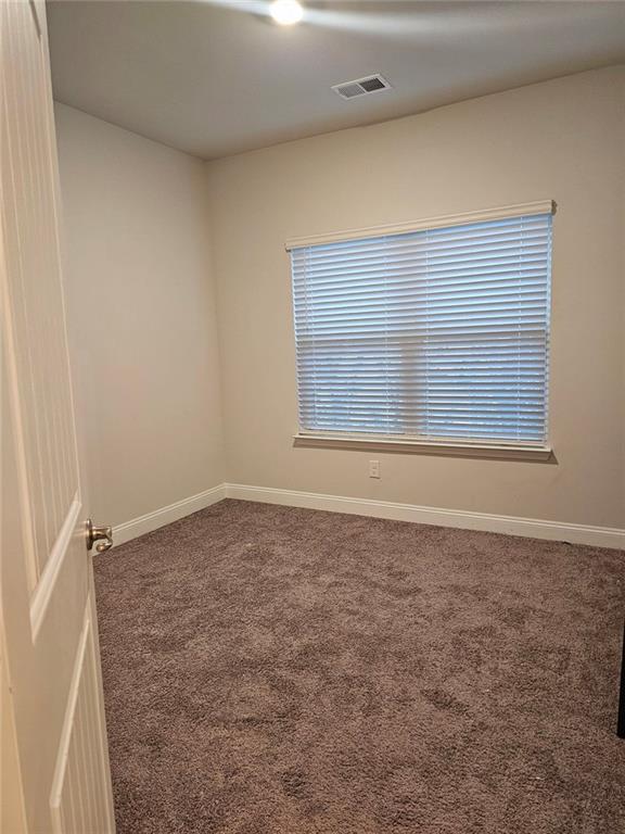 2153 Red Oak Circle Union City, GA 30291 - Photo 6 of 34 a view of an empty room with a window