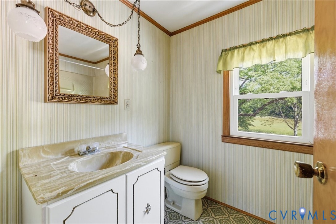 8100 Sandy Ridge Road Hopewell, VA 23860 - Photo 24 of 36 Bathroom featuring a single vanity with a decorati