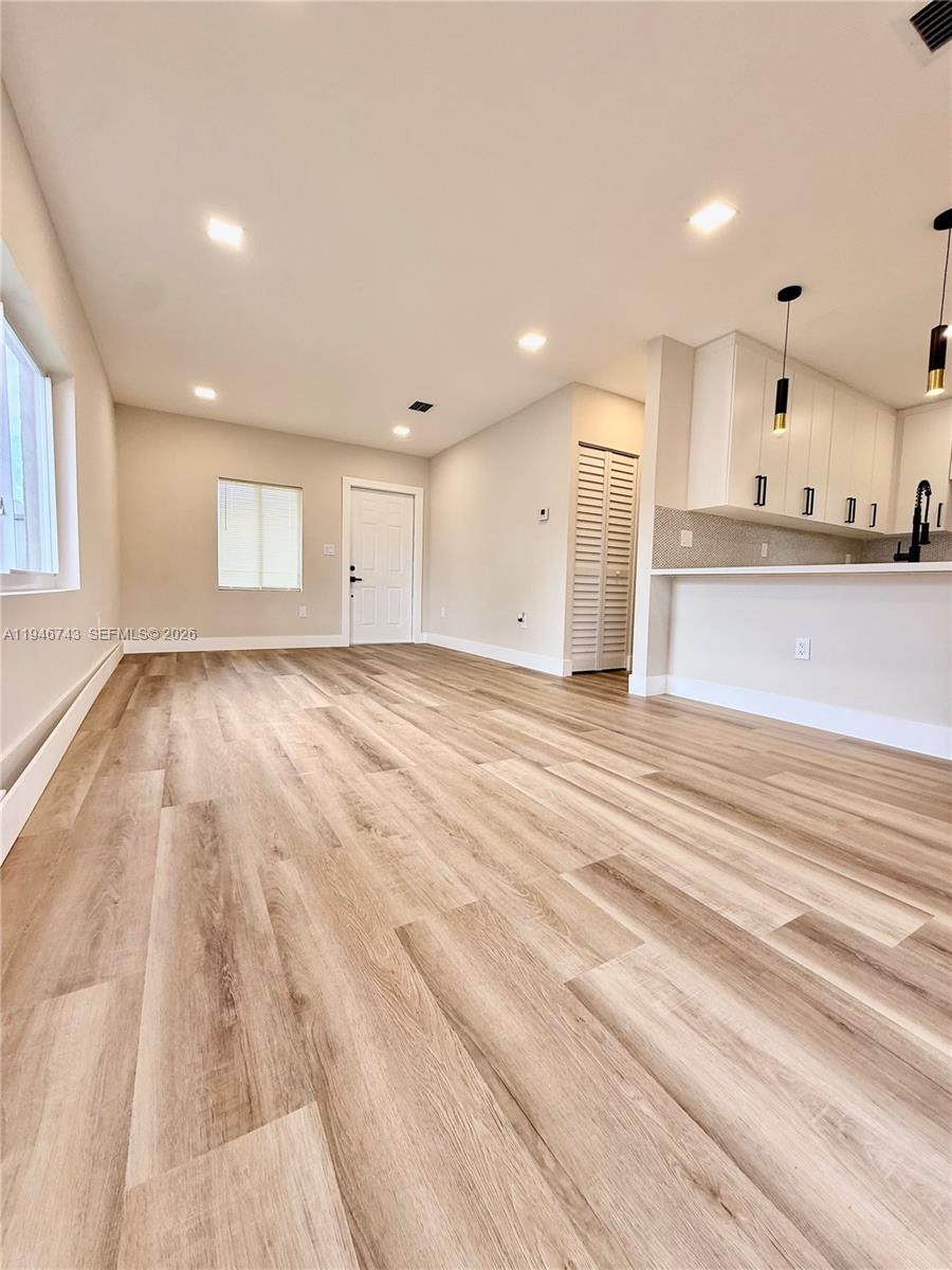 14600 Harrison Street Miami, FL 33176 - Photo 27 of 32 a view of an empty room with kitchen appliances and a window