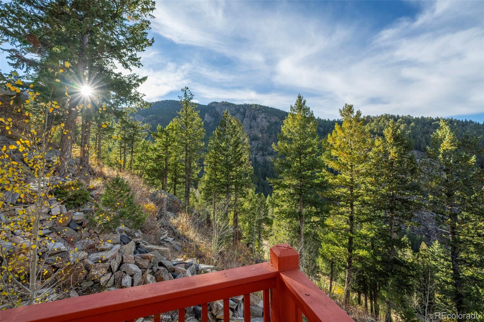 900 Sawmill Creek Road Evergreen, CO 80439 - Photo 12 of 50 a view of a city from a balcony