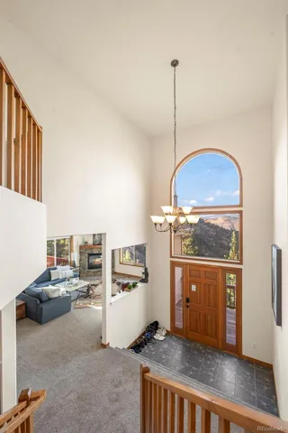 a kitchen with refrigerator and cabinets