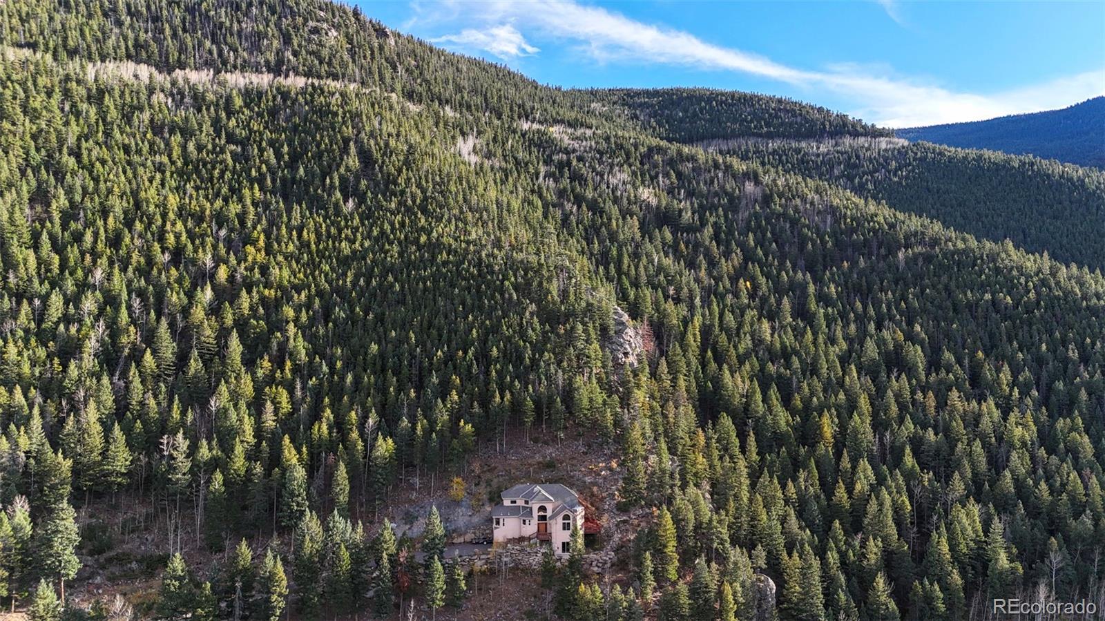 900 Sawmill Creek Road Evergreen, CO 80439 - Photo 4 of 50 a view of a city