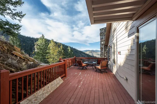 a view of balcony with couch and wooden floor