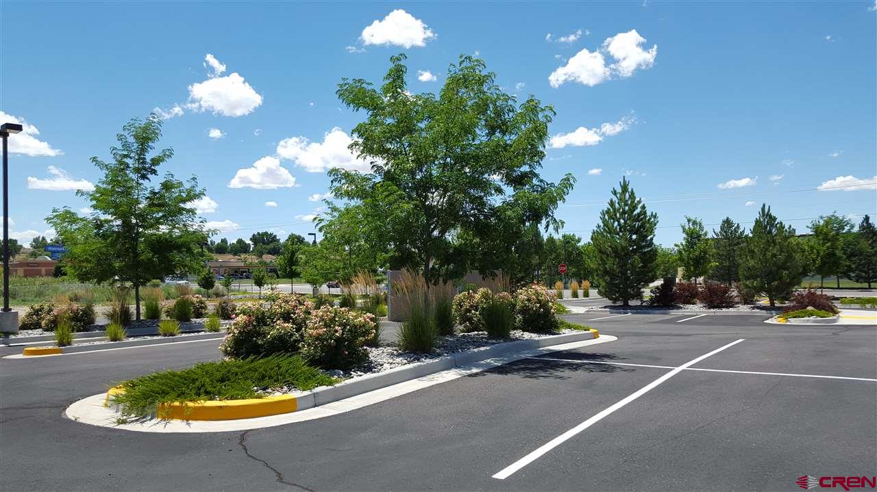 300 Stafford Lane, Unit 30212 Delta, CO 81416 - Photo 7 of 7 a view of a park with a fountain and a fire pit
