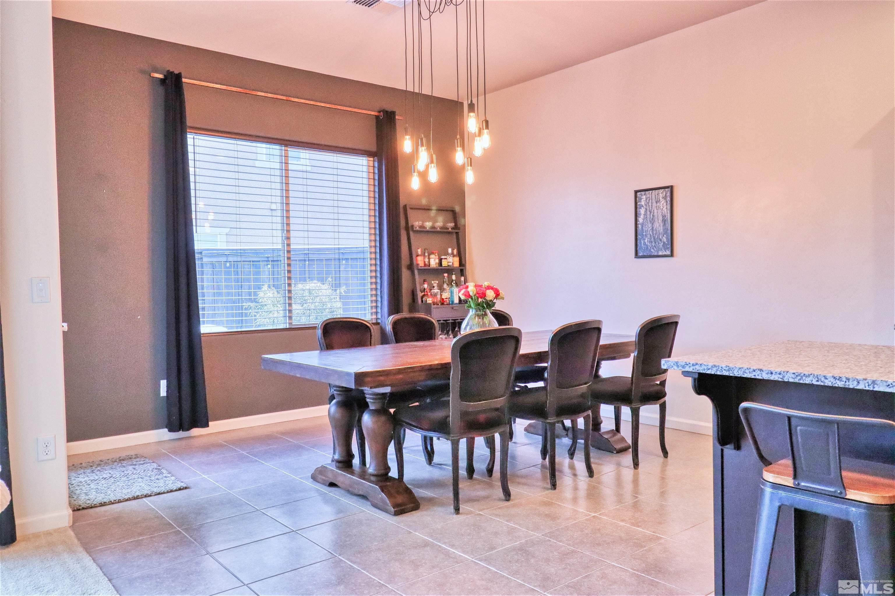 2790 Bonfire Lane Reno, NV 89521 - Photo 14 of 37 a view of a dining room with furniture and window