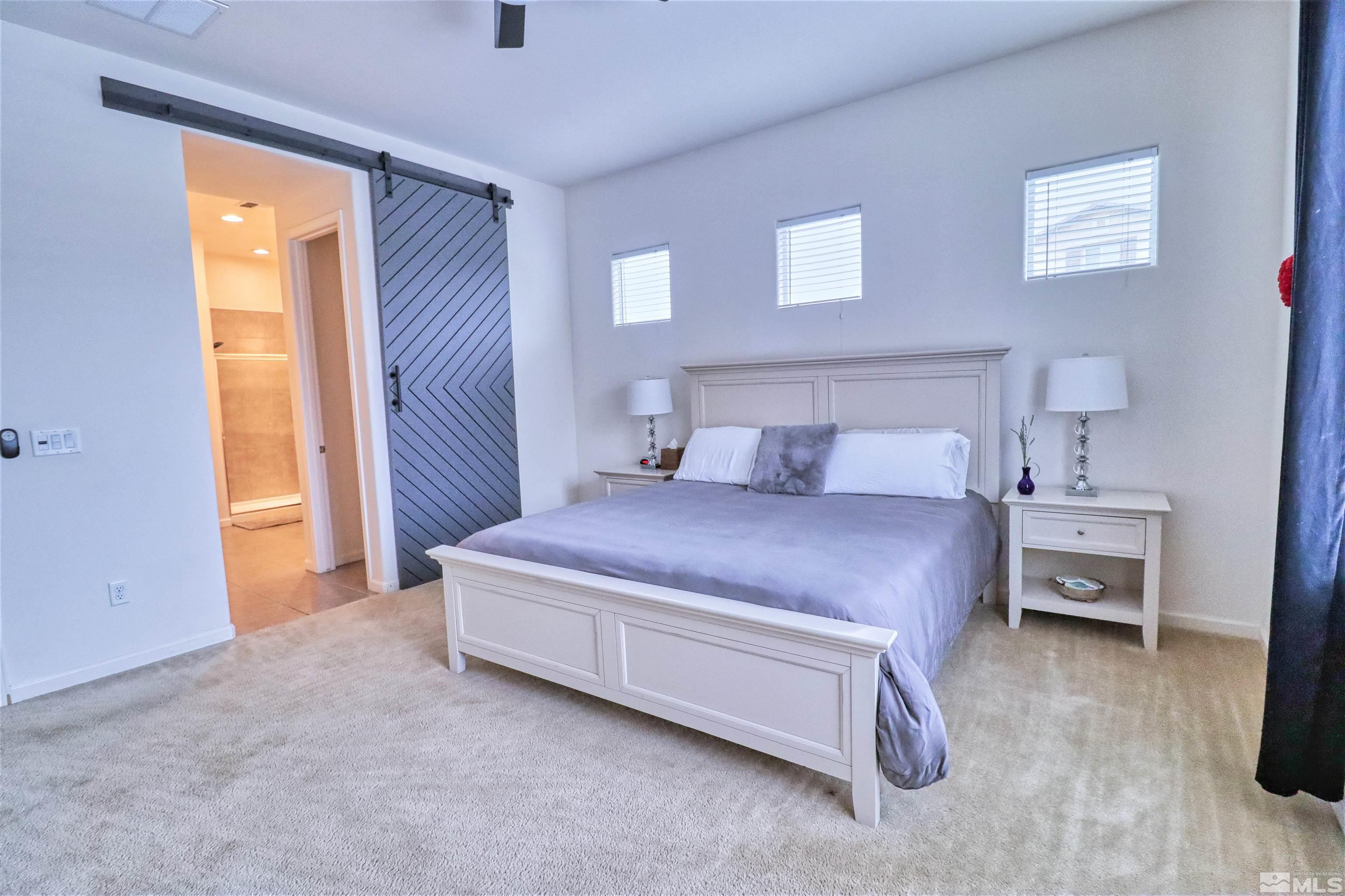 2790 Bonfire Lane Reno, NV 89521 - Photo 17 of 37 a bedroom with a bed and a window