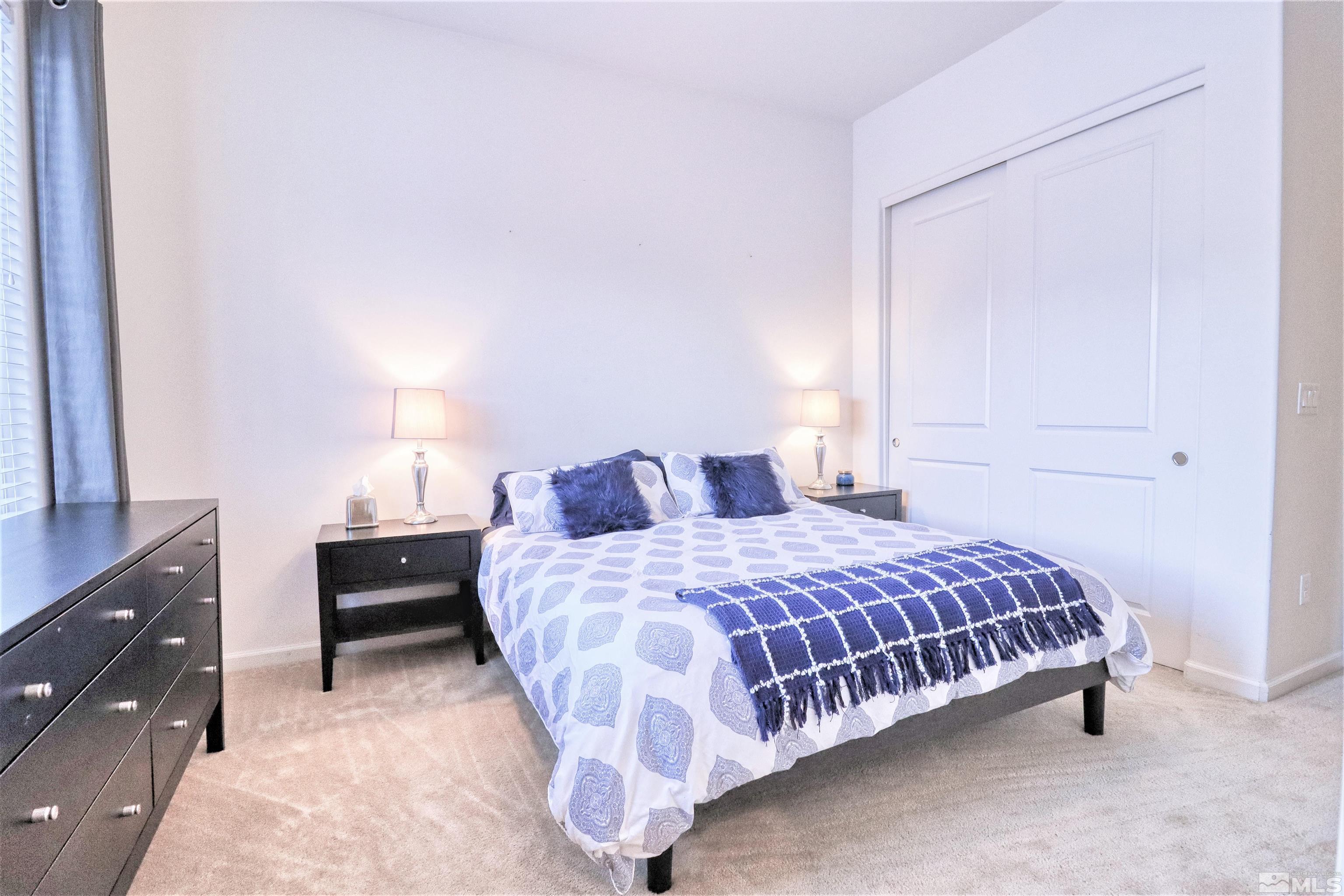 2790 Bonfire Lane Reno, NV 89521 - Photo 20 of 37 a bedroom with a bed and with furniture