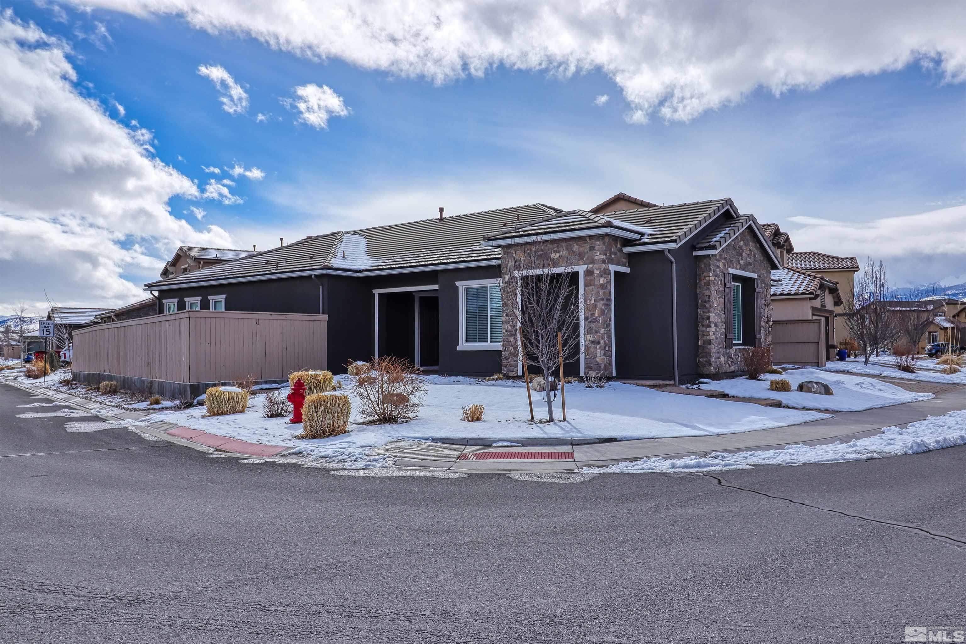 2790 Bonfire Lane Reno, NV 89521 - Photo 33 of 37 a front view of a house with patio and garden